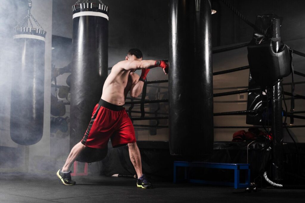 side-view-man-training-boxing-competition_23-2148416703